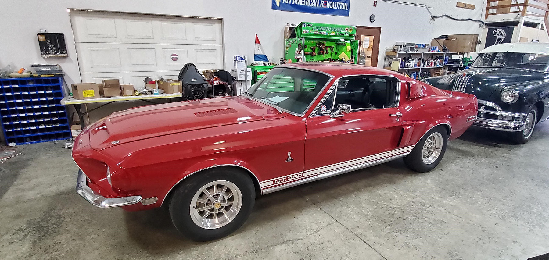 Red 1968 Shelby GT350 in the Top Secret shop
